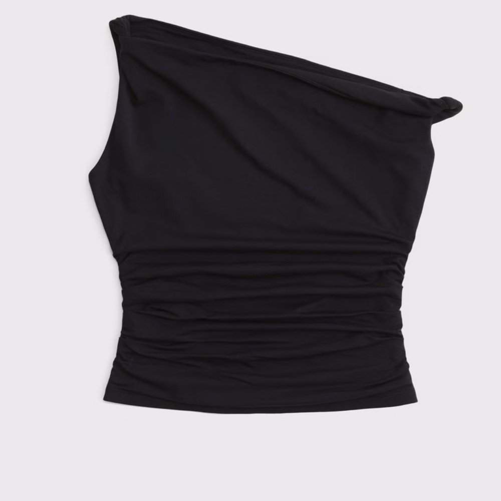 Asymmetrical twist top